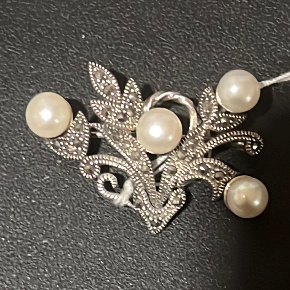 Elegant Silver and Pearl Brooch